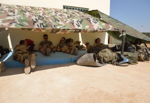 French soldiers of the 5th Combat Helicopter Regiment  relax on January 19 at the airbase near Bamako.