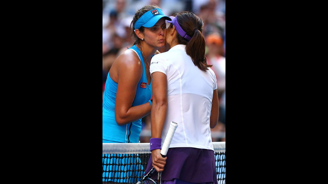 German Julia Goerges, left, congratulates Na Li of China on winning their fourth-round match 7-6 (6), 6-1 on January 20.