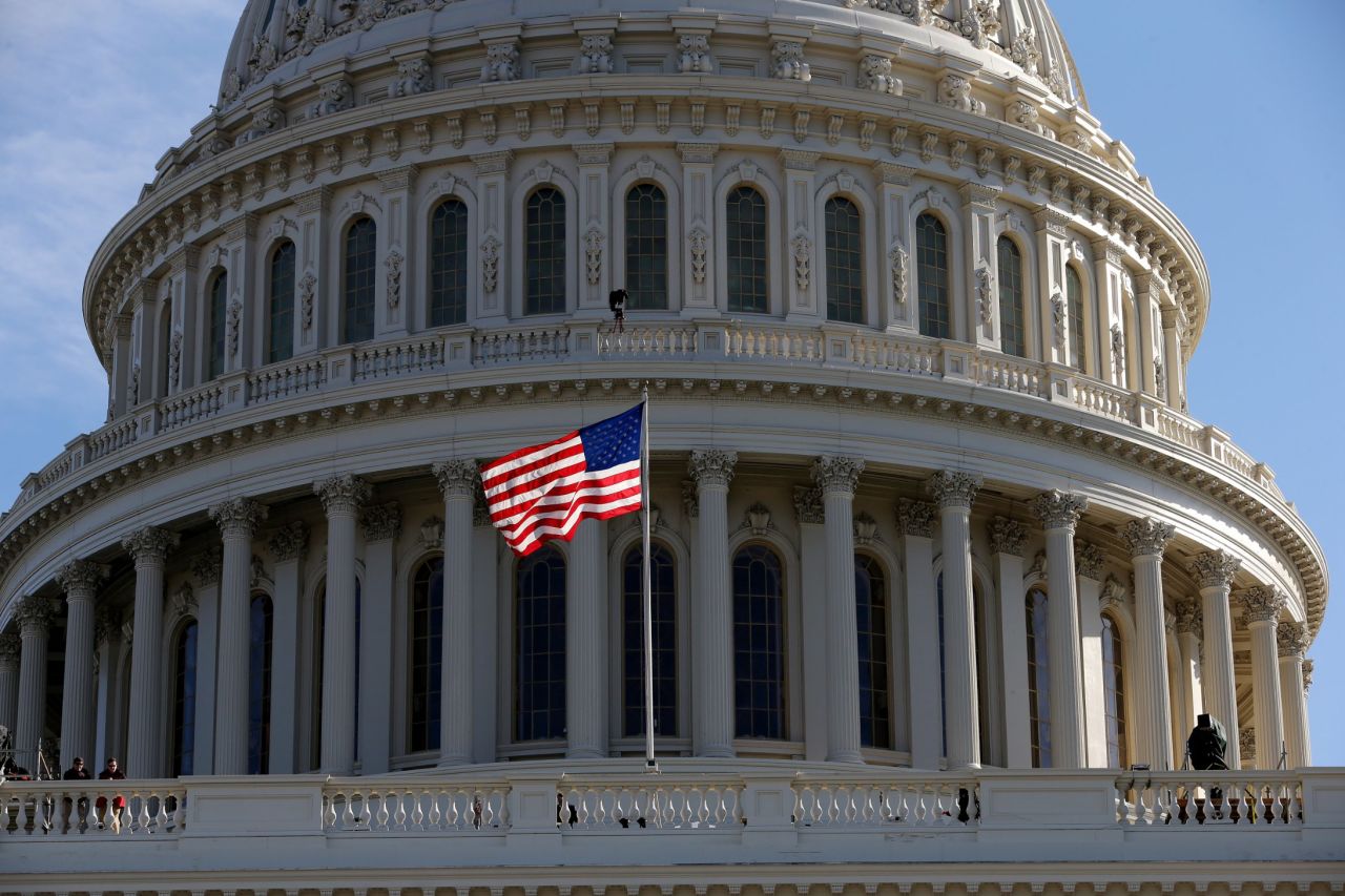 An American flag waves at the U.S. Capitol building on January 20 as Washington prepares for Obama's second inauguration. 