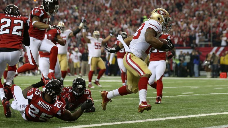 LaMichael James of the San Francisco 49ers scores a 15-yard rushing touchdown in the second quarter.