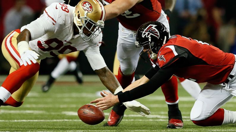 Falcons quarterback Matt Ryan fumbles the ball. It was recovered by No. 99 Aldon Smith of the San Francisco 49ers.