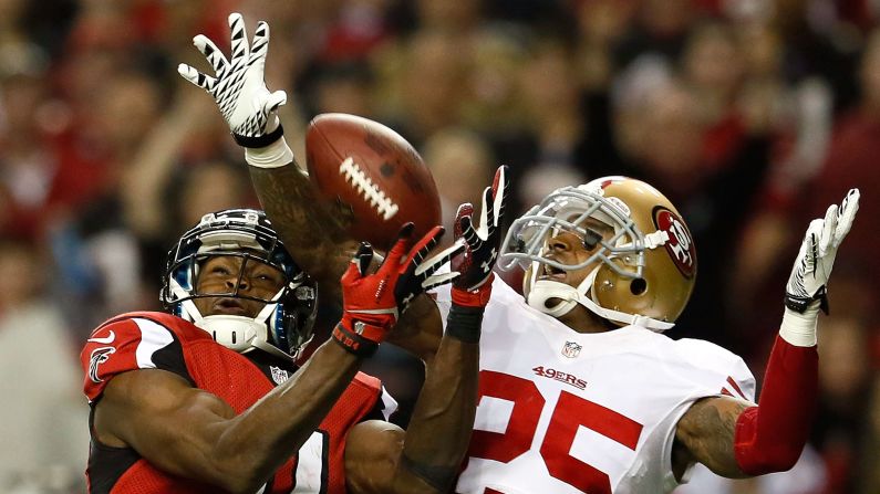 Tarell Brown of the San Francisco 49ers breaks up a pass intended for Julio Jones of the Atlanta Falcons.