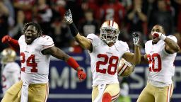 From left, Anthony Dixon, Darcel McBath and Perrish Cox of the San Francisco 49ers celebrate after stopping the Atlanta Falcons on fourth down in the fourth quarter of the NFC Championship Game. The 49ers defeated the Falcons 28-24 at the Georgia Dome in Atlanta on Sunday, January 20.