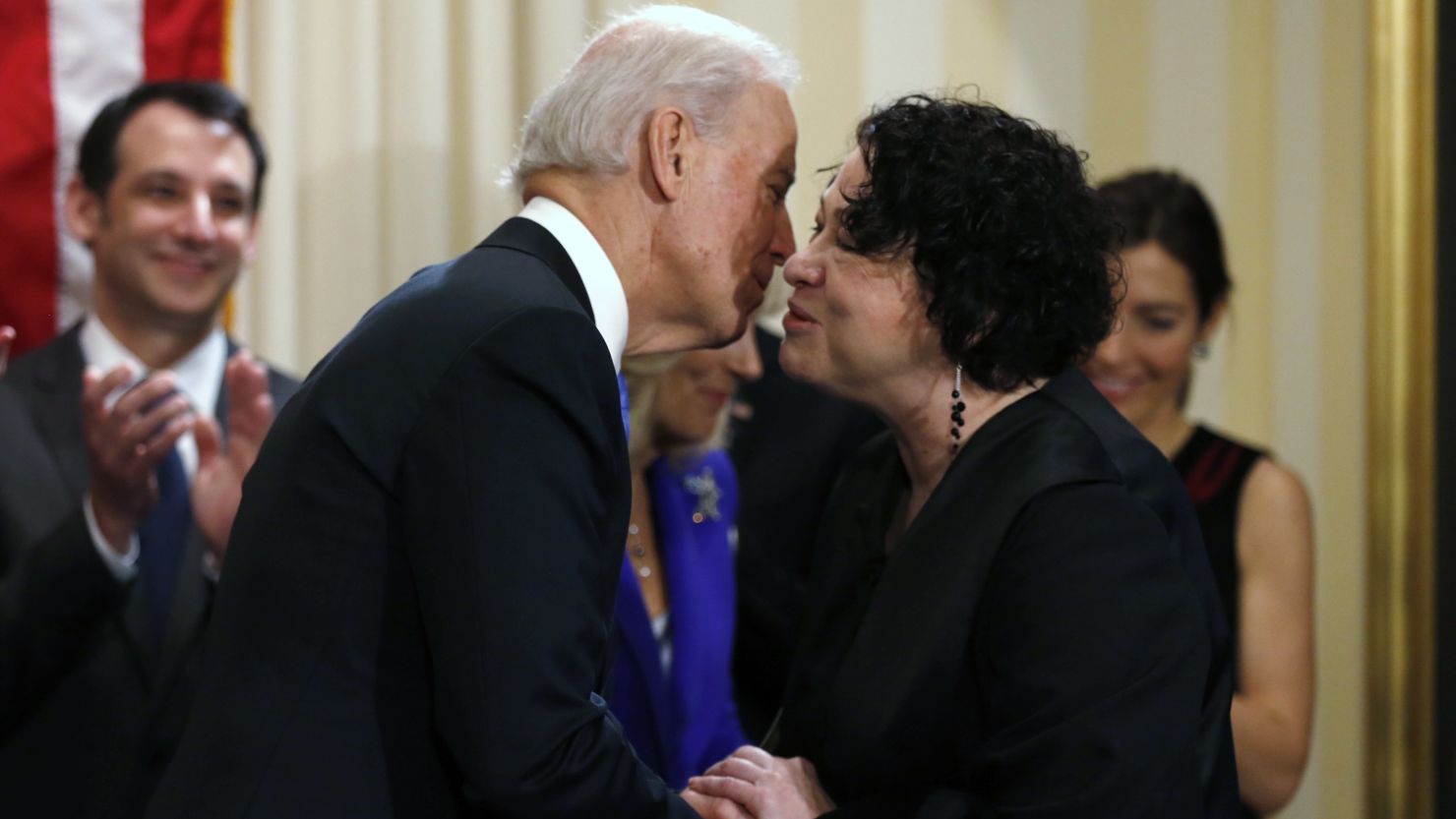 Vice President Joe Biden kisses Supreme Court Justice Sonia Sotomayor after she administered the oath of office to him Sunday.