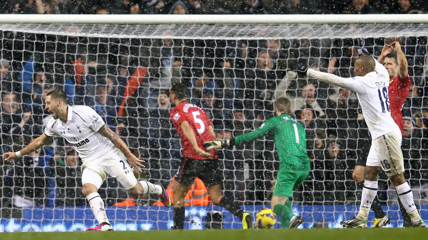 Clint Dempsey (far left) wheels away after grabbing an injury time equaliser for Tottenham against Manchester United