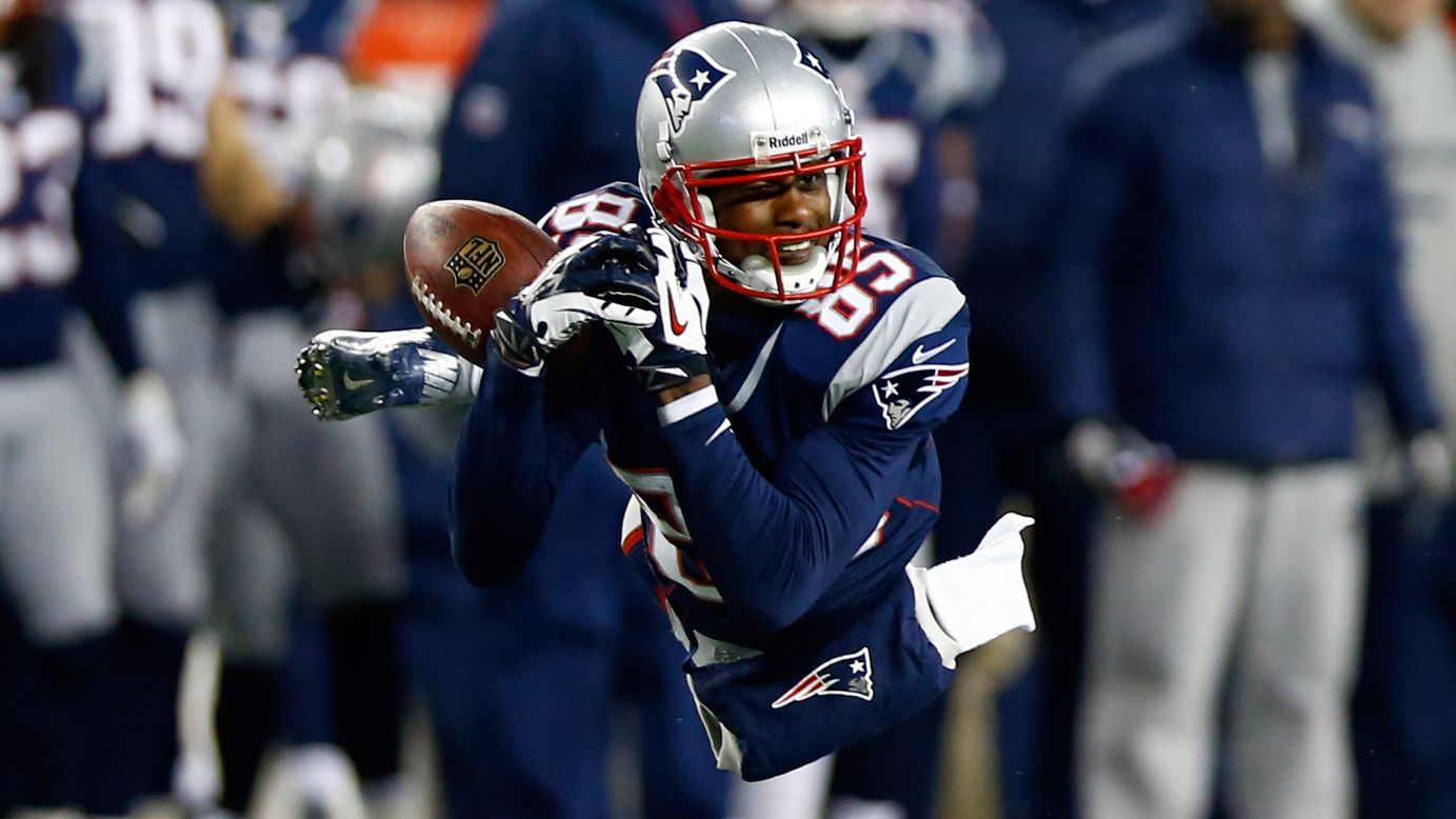 Brandon Lloyd of the New England Patriots misses a catch during Sunday's game against the Baltimore Ravens.