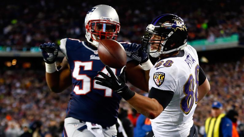 Dennis Pitta of the Baltimore Ravens fails to catch a pass in the end zone against Dont'a Hightower of the New England Patriots during the AFC Championship game at Gillette Stadium in Foxboro, Massachusetts, on Sunday, January 20.