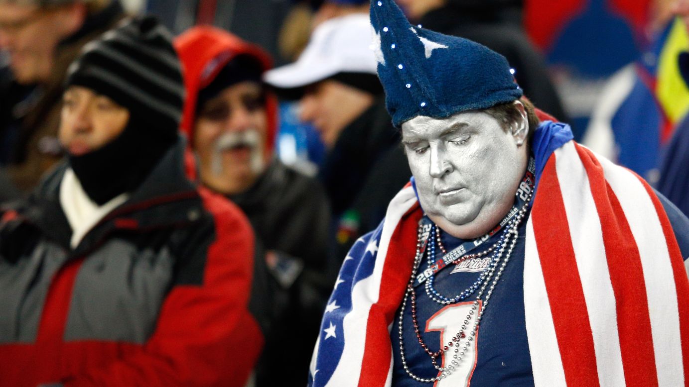 A New England Patriots fan reacts to a play during the AFC Championship game.