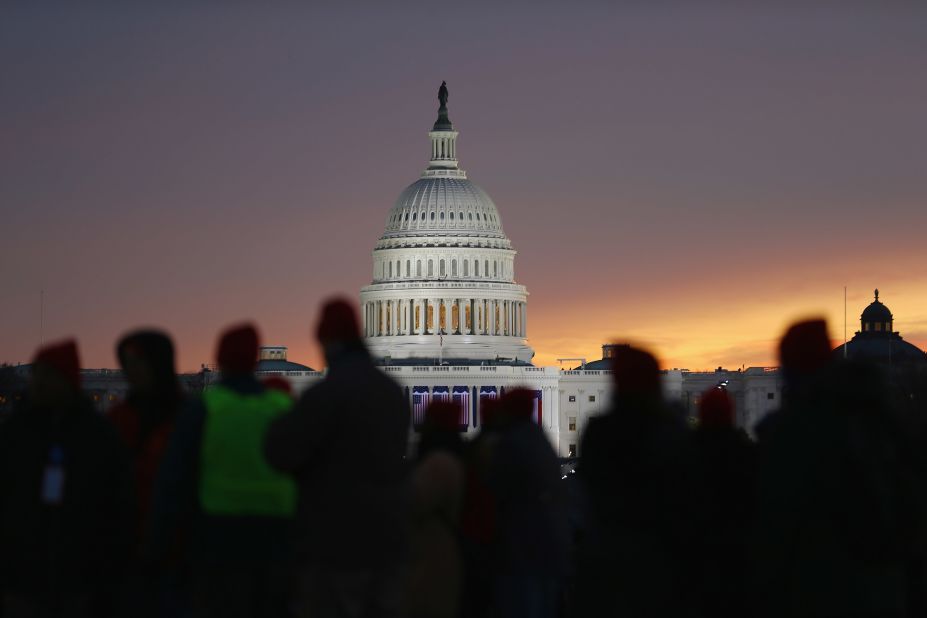 People gather near the Capitol on the National Mall for Monday's inauguration ceremony.