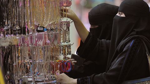 (File photo) Saudi women shop at a local mall in Riyadh on  August 18, 2012.