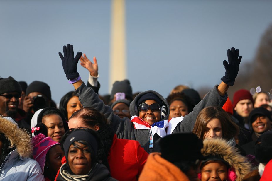 People gather near the U.S. Capitol building on the National Mall for the ceremony on Monday.