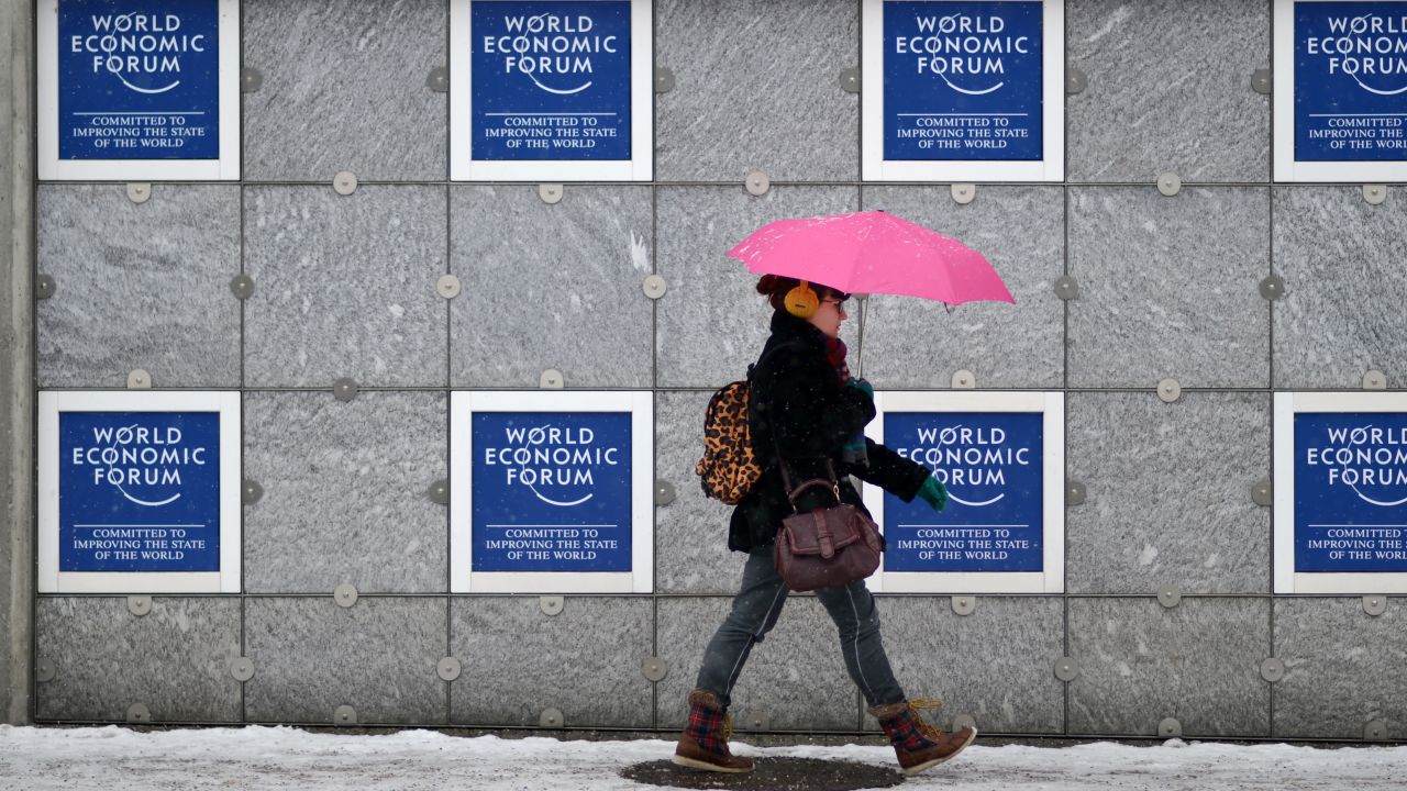 A woman passes the congress center on January 21, 2013 at the Swiss resort of Davos.