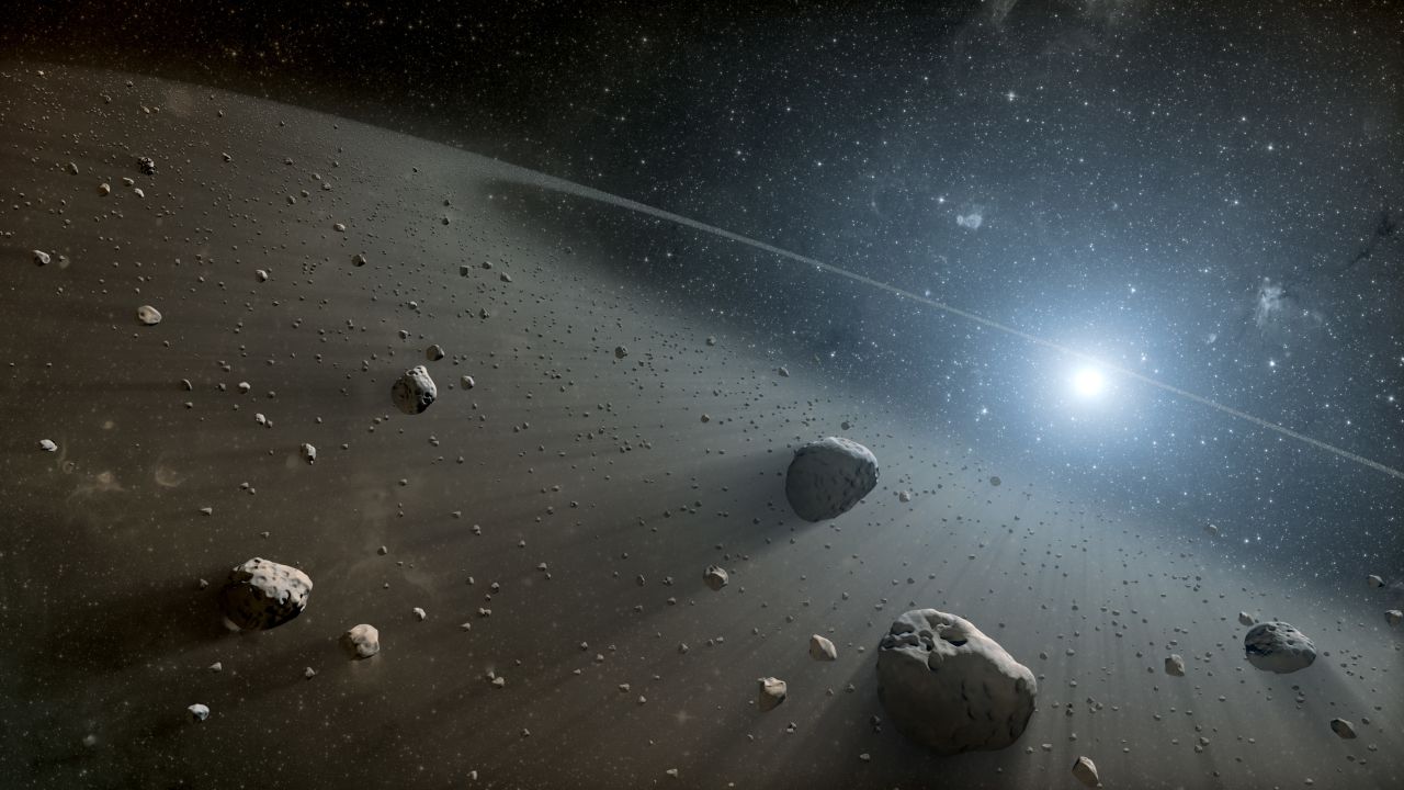 Astronomers say they have discovered an asteroid belt around the star Vega, seen in this illustration. NASA's Spitzer space telescope and the European Space Agency's Herschel Space Observatory were used to observe the star, which is the second brightest in the northern sky.