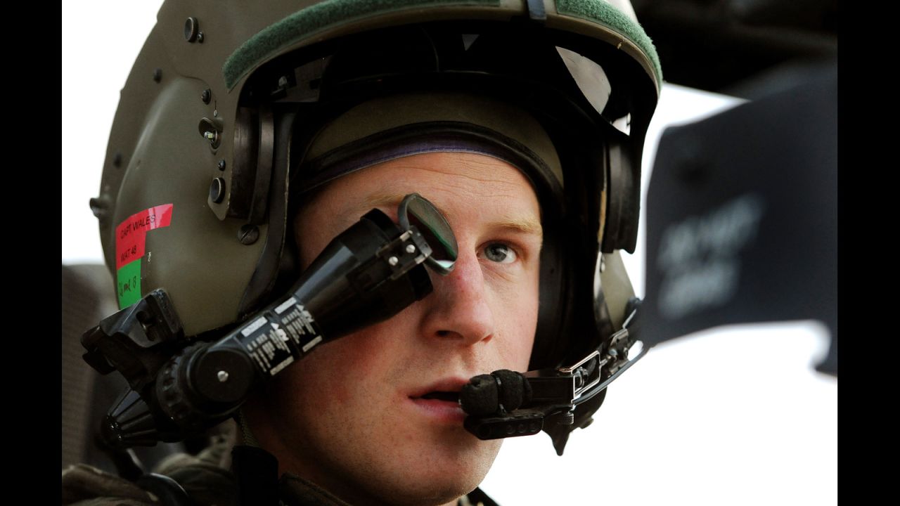Prince Harry, or Capt. Wales as he is known in the British Army, wears a monocle gun sight as he sits in the front seat of an Apache helicopter on December 12, 2012.  Harry was stationed at the British-controlled Camp Bastion in southern Afghanistan from September 2012 until January 2013.