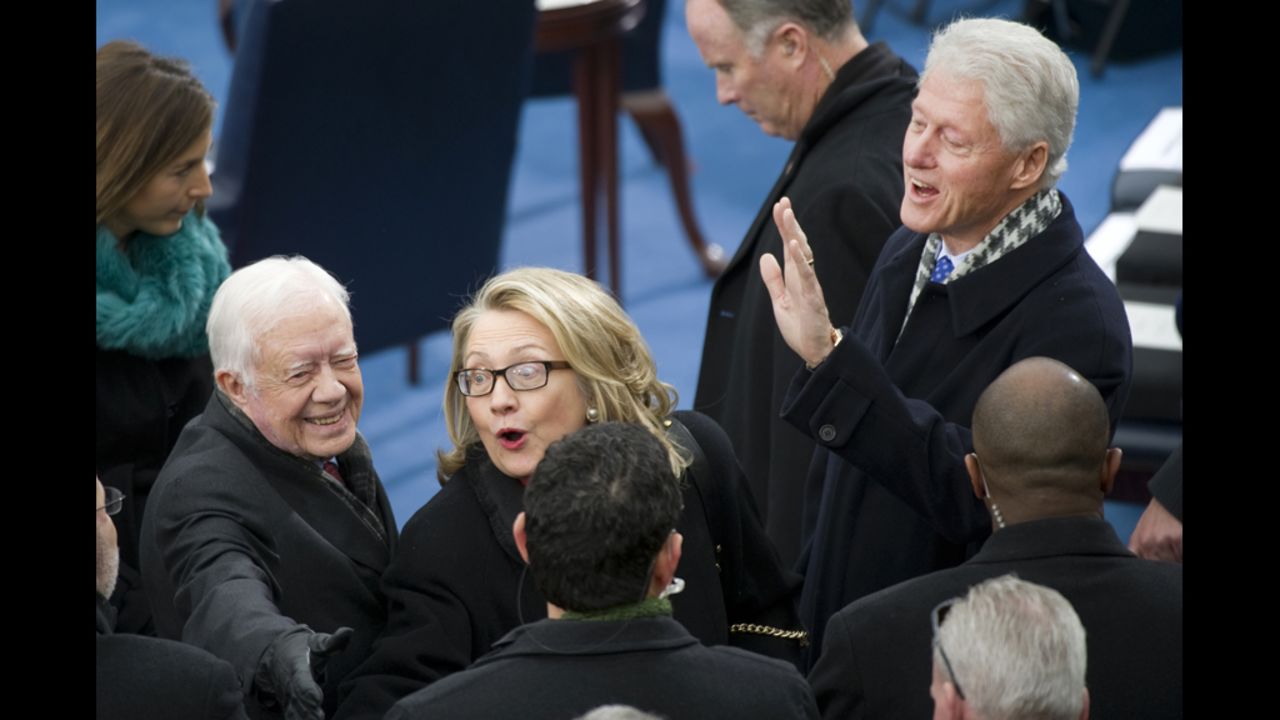 Former President Jimmy Carter, left, Secretary of State Hillary Clinton, center, and former President Bill Clinton arrive at the Inauguration for President Obama's second term of office on Monday. 