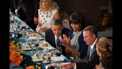 President Obama shares a moment with House Speaker John Boehner, second from right, as first lady Michelle Obama applauds at the inaugural luncheon in Statuary Hall on Inauguration Day at the U.S. Capitol building on Monday.