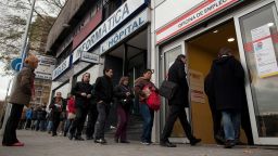 MADRID, SPAIN - DECEMBER 04: People queue to enter a government employment office as it opens on December 4, 2012 in Madrid, Spain. Spain's registered unemployment figures rose by 74,296 hitting a new record of 4.91million according to Madrid's Labor Ministry. The current unenployment rate in Spain stands at 26 % while nationalised lender Bankia group plans to cut 6,000 jobs as a condition for the European bank bailout for Spain. (Photo by Pablo Blazquez Dominguez/Getty Images)