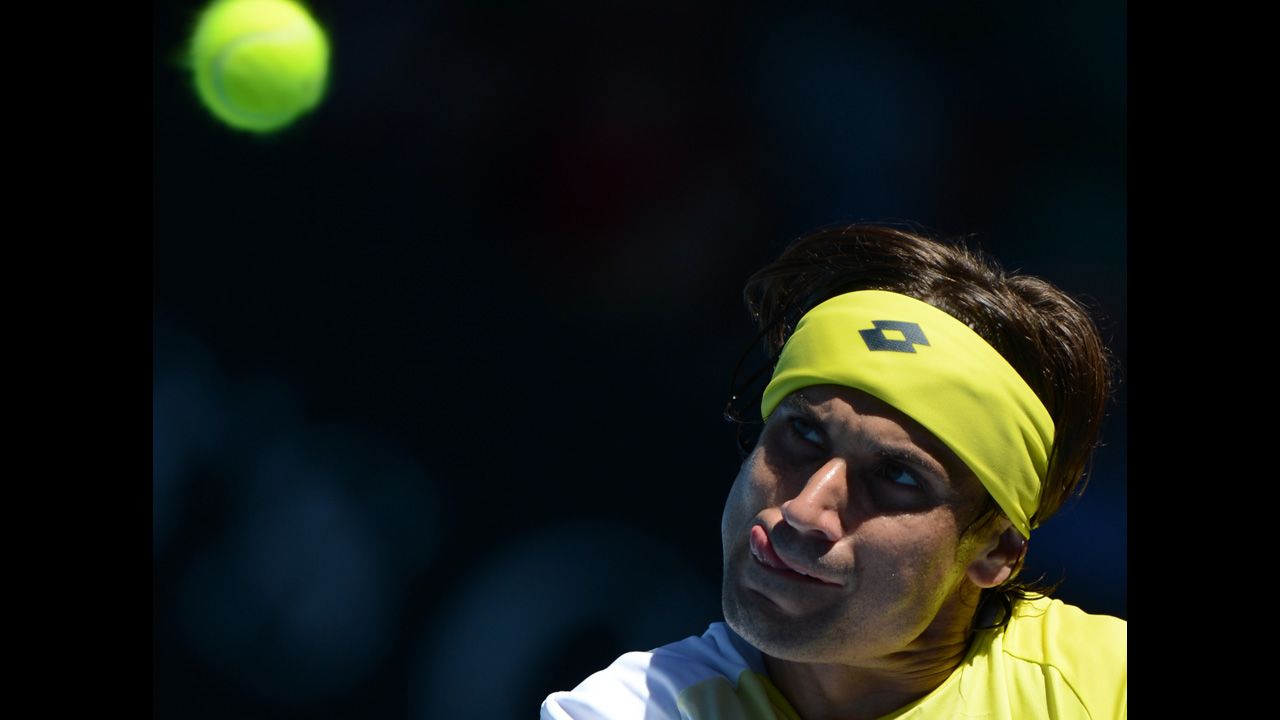 Spain's David Ferrer watches the ball during his men's singles match against compatriot Nicolas Almagro on January 22. Ferrer defeated Almagro 4-6, 4-6, 7-5, 7-6 (4), 6-2.