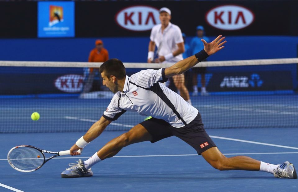 Novak Djokovic of Serbia stretches for the ball in his quarterfinal match against Tomas Berdych of the Czech Republic on Tuesday, January 22. Djokovic won 6-1, 4-6, 6-1, 6-4. 