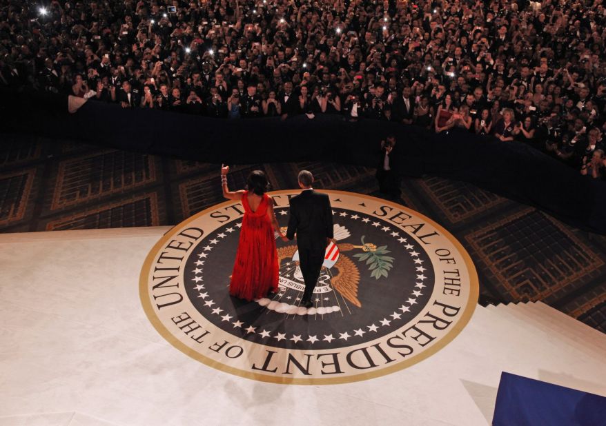 President Barack Obama and first lady Michelle Obama head out for their first dance together at the Commander-in-Chief's Ball, honoring U.S. service members and their families, at the Walter E. Washington Convention Center on Monday, January 21.