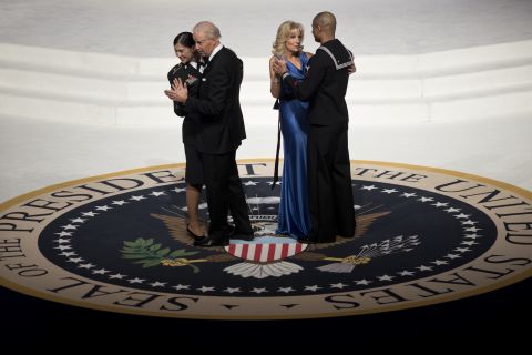 Vice President Joe Biden and his wife, Jill Biden, each dance with service members at the Commander-in-Chief's Ball on January 21.