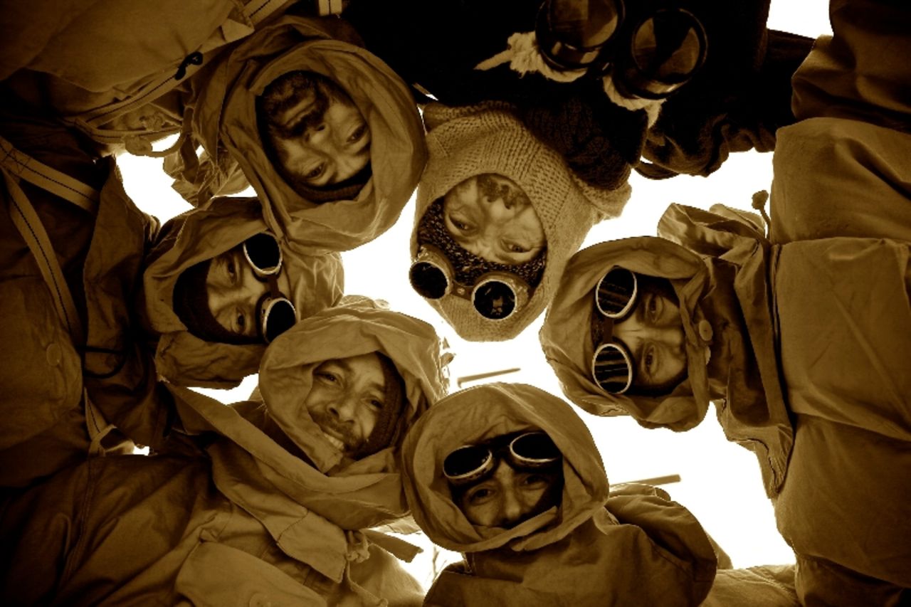 Jarvis and his five crew mates huddle in full 1920s explorer apparel for an appropriately sepia-hued photo taken on their way to Elephant Island. 