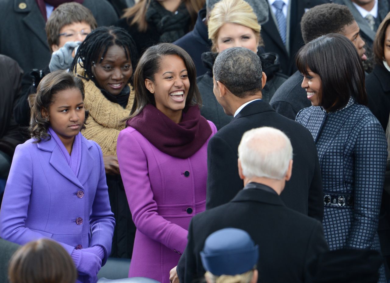 Malia greets her father President Barack Obama.