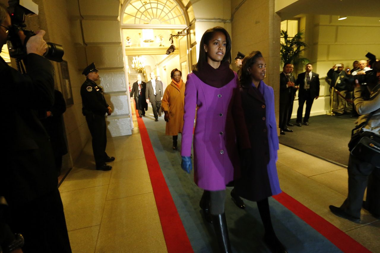 Malia and Sasha are escorted through the corridor to the west door of the U.S. Capitol to begin swearing-in ceremonies on January 21.