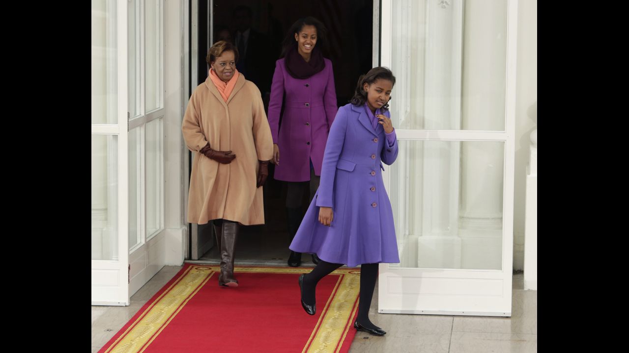 From left, the first lady's mother, Marian Robinson, Malia and Sasha depart the White House for the U.S. Capitol for the Inauguration.