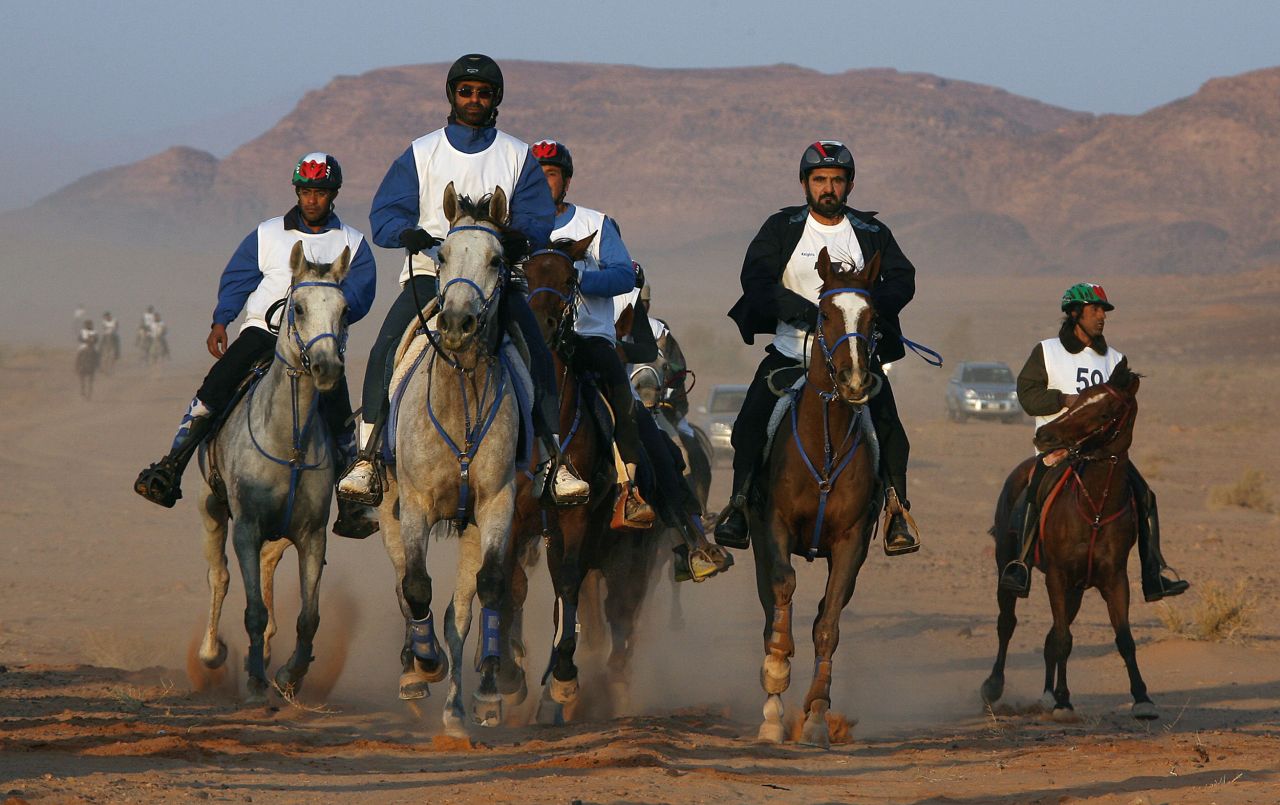 As well as being world champion, Sheikh Mohammed (second right) has won many races on home soil and has a showpiece endurance event named after him -- the Al Maktoum Cup.   