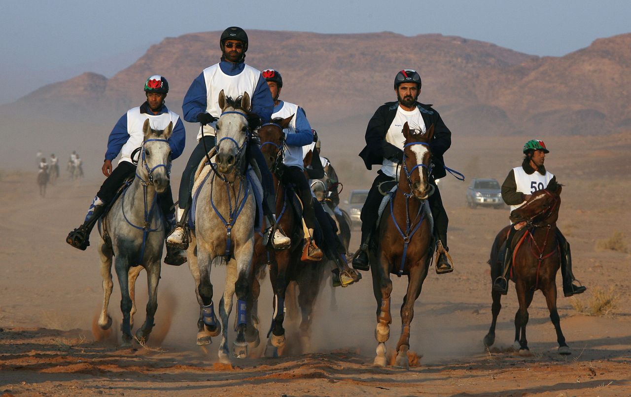 As well as being world champion, Sheikh Mohammed (second right) has won many races on home soil and has a showpiece endurance event named after him -- the Al Maktoum Cup.