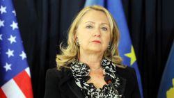 Clinton stands during a press conference following meetings at the Prime Minister's Office in Pristina, Kosovo, on October 31, 2012. Clinton said that Kosovo's unilaterally declared independence, fiercely opposed by Serbia, was 'not up for discussion'. 