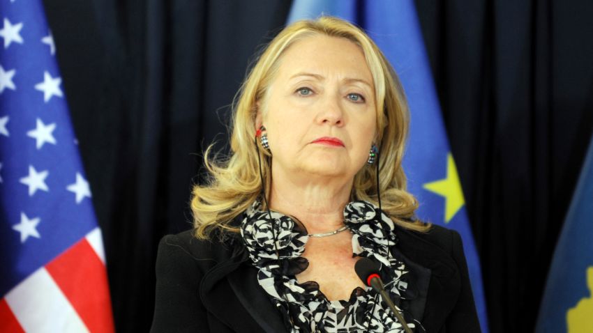 Clinton stands during a press conference following meetings at the Prime Minister's Office in Pristina, Kosovo, on October 31, 2012. Clinton said that Kosovo's unilaterally declared independence, fiercely opposed by Serbia, was 'not up for discussion'. 