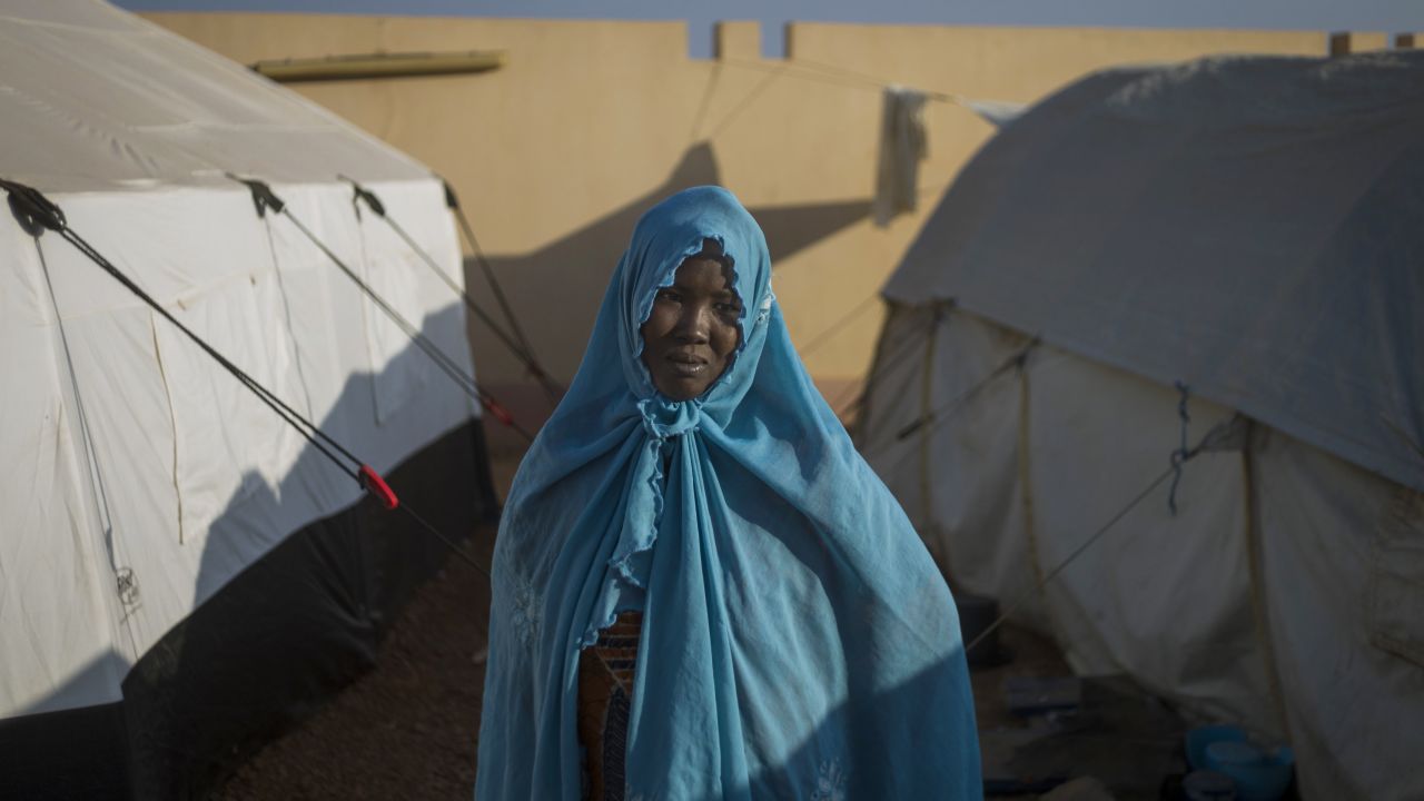 A woman who fled northern Mali sits at a camp for internally displaced persons in Sevare on Wednesday, January 23. The EU announced 20 million euros of extra humanitarian aid to help Malians fleeing fighting, its second such donation in as many months. 
