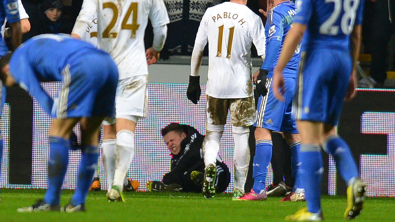 A ball boy grimaces after an altercation with Chelsea midfielder Eden Hazard at The Liberty stadium in Cardiff, January 23, 2013. 