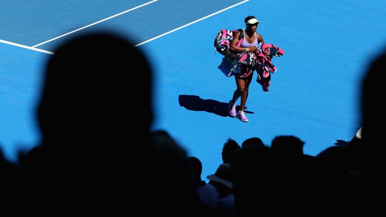 Stephens walks off the court Wednesday after winning her quarterfinal match against Williams at the Australian Open.