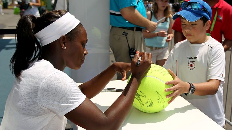 At the Sony Ericsson Open in 2011, Stephens signs an autograph for a young fan.