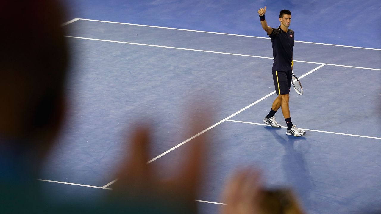 Novak Djokovic of Serbia celebrates winning his semifinal match against David Ferrer of Spain during the Australian Open in Melbourne on Thursday, January 24. Djokovic won 6-2, 6-2, 6-1.