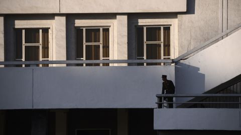 A North Korean soldier stands on a balcony in Pyongyang in April 2012.