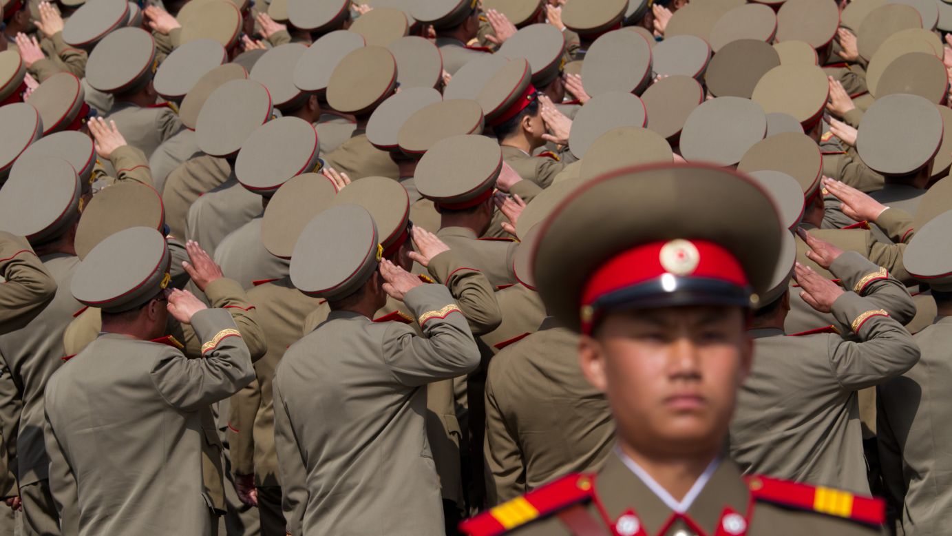 North Korean soldiers salute during a military parade in Pyongyang in April 2012.