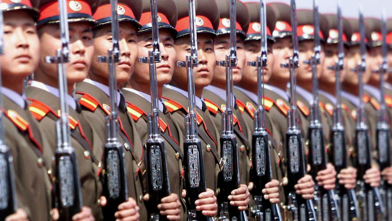 A North Korean military honor guard stands at attention at Pyongyang's airport in May 2001.