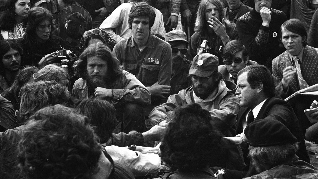 Kerry listens to Sen. Ted Kennedy as he speaks to Vietnam veterans during a demonstration by Vietnam Veterans Against the War in Washington in May 1971.
