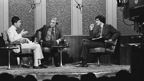 John O'Neill, left, and Kerry, both decorated war veterans and lieutenants junior grade in the Navy and commanders of swift boats that policed the rivers of Vietnam, discussed their opposing views of the Vietnam War with host Dick Cavett, center, on September 24, 1971.