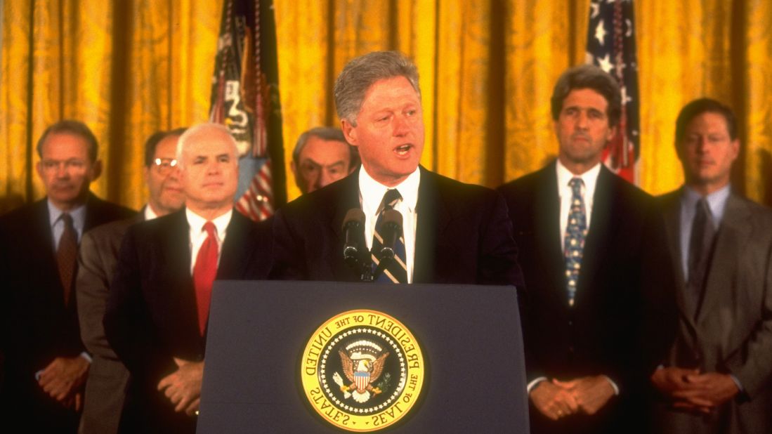 Kerry stands with congressmen and Vice President Al Gore as President Bill Clinton announces his intent to normalize relations with Vietnam in 1995.