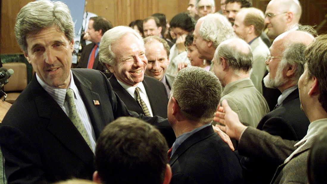 Kerry and Sen. Joe Lieberman greet supporters on April 18, 2002, on Capitol Hill after the Senate voted to prevent further debate about initiating new oil exploration in the Arctic National Wildlife Refuge in Alaska.