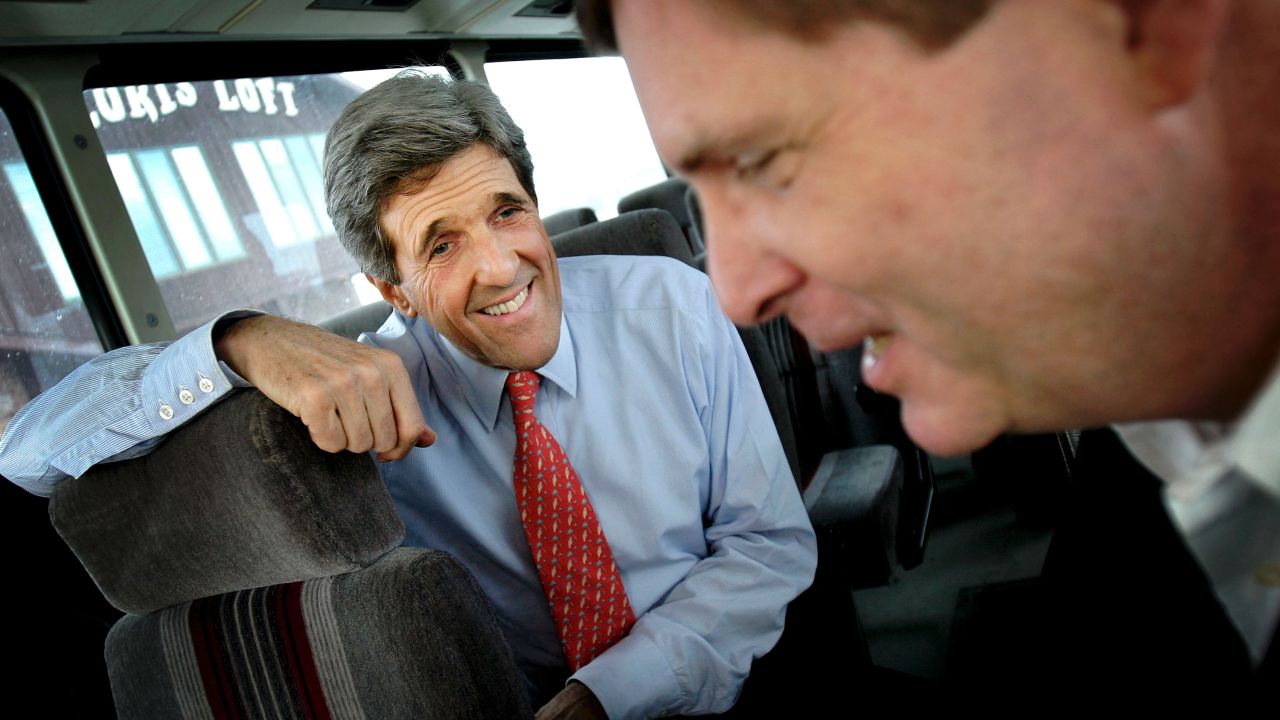 Kerry jokes with Iowa Gov. Tom Vilsack before speaking to supporters at Jerry's Restaurant on December 14, 2003, in Mt. Plesant, Iowa.