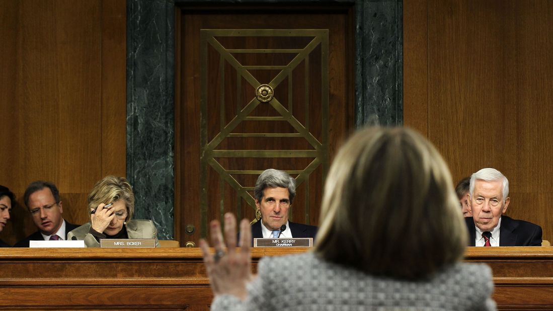 Secretary of State Hillary Clinton testifies before, from right, ranking member Sen. Richard Lugar, committee chairman Kerry and Sen. Barbara Boxer during a hearing before the Senate Foreign Relations Committee on March 2, 2011.