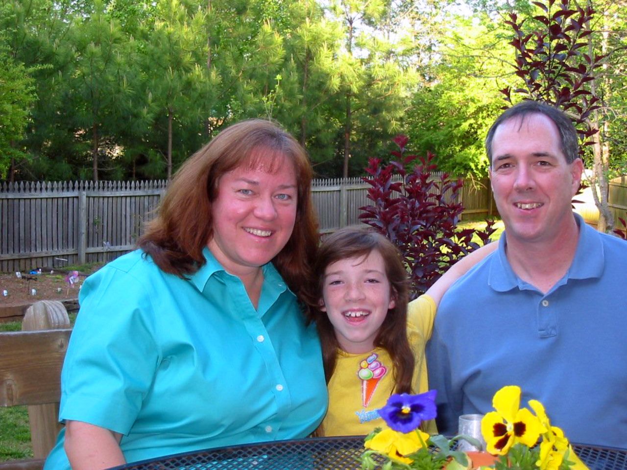 Self-described emotional eater Charmaine Jackson, here with her daughter, Caroline, and husband, Kelly, in 2004, weighed 230 pounds at the time and was on her way to a high of 260. Click through to see her weight loss transformation after she began to keep track of her eating habits through daily journaling: