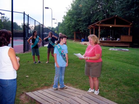 Jackson attends a Girl Scouts ceremony with her daughter in September 2007. She had just received news that she would be laid off from her job in December. She remembers being uncomfortable wearing shorts in public. 