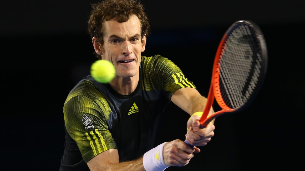 Andy Murray of Great Britain plays a backhand in his semifinal match against Roger Federer of Switzerland on January 25. Murray defeated Federer 6-4, 6-7 (5-7), 6-3, 6-7 (2-7), 6-2. 